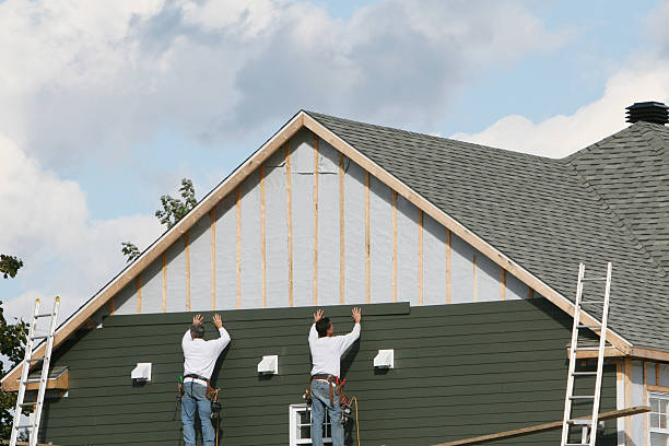 Professional Storm Damage Siding Repair technician working in Brunswick, MD